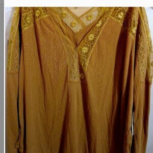 NWT Free People tan tunic with lace. Size Medium.
